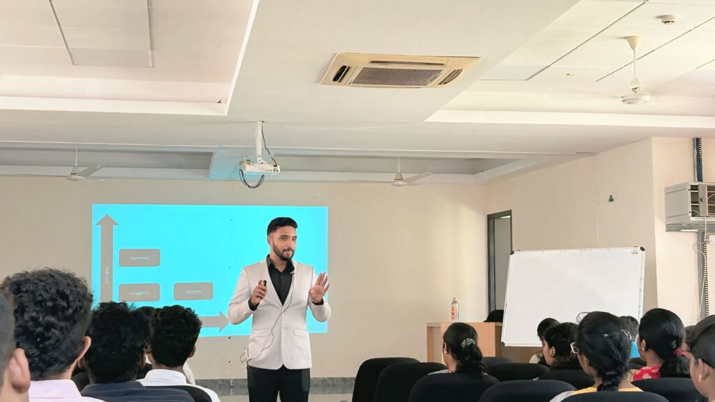 Delivering a public speech to students on public speaking and presentation.  